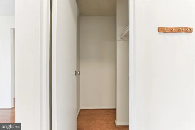 a view of hallway with closet