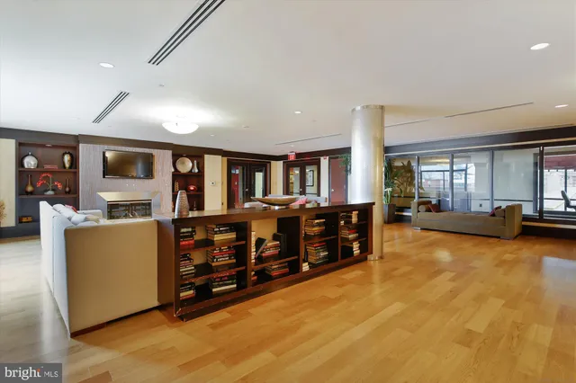a view of a room with rack and bicycle