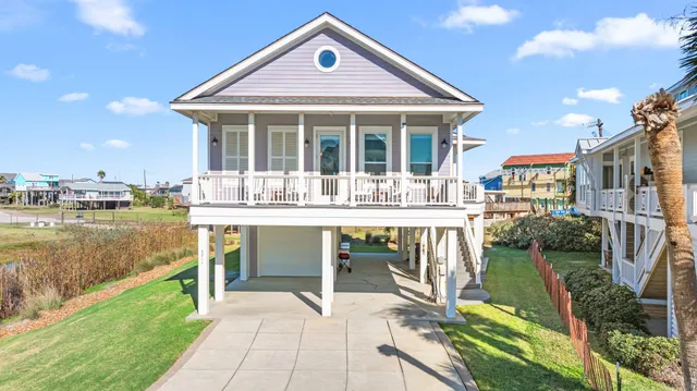 a patio with table and chairs
