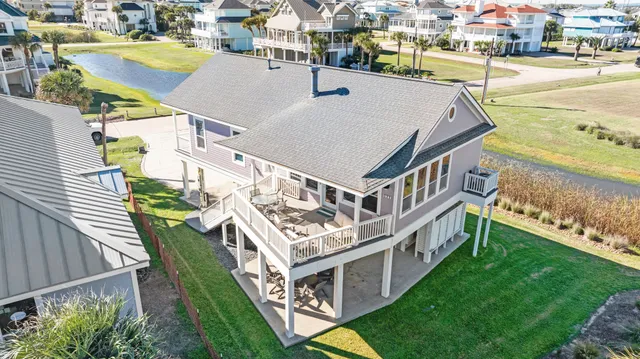 a view of a house with roof deck