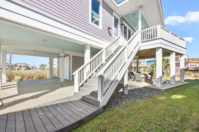 a view of staircase with white walls