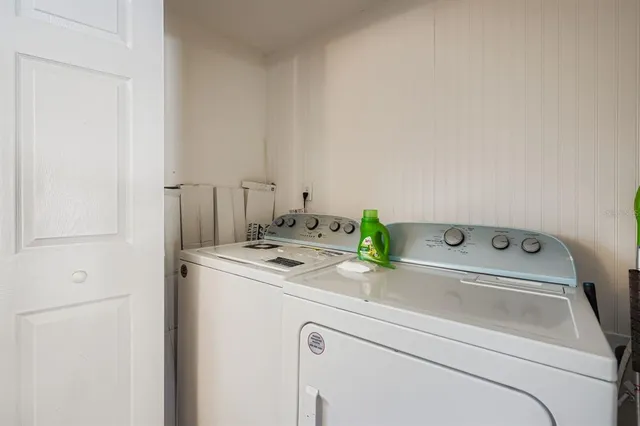 a utility room with dryer and washer