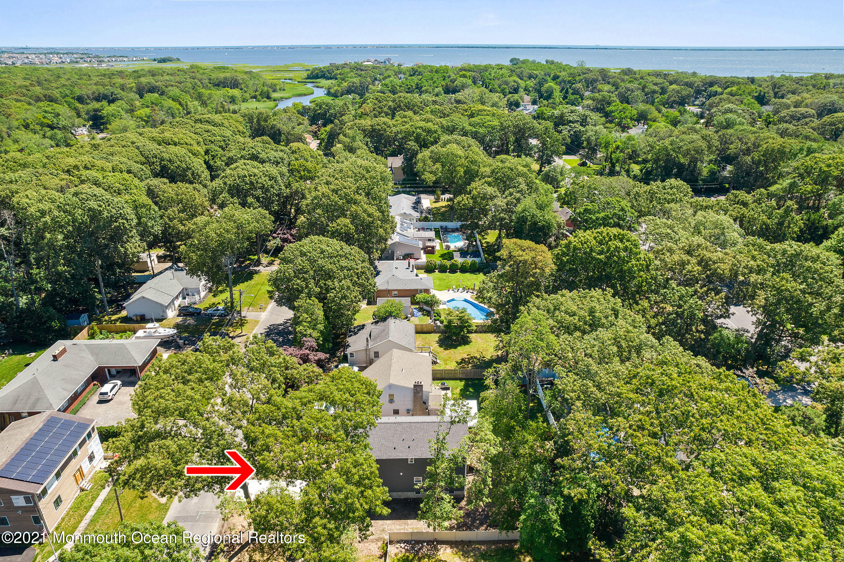 308 Riverside Drive Bayville, NJ 08721 - Photo 11 of 35 an aerial view of residential houses with outdoor space and trees