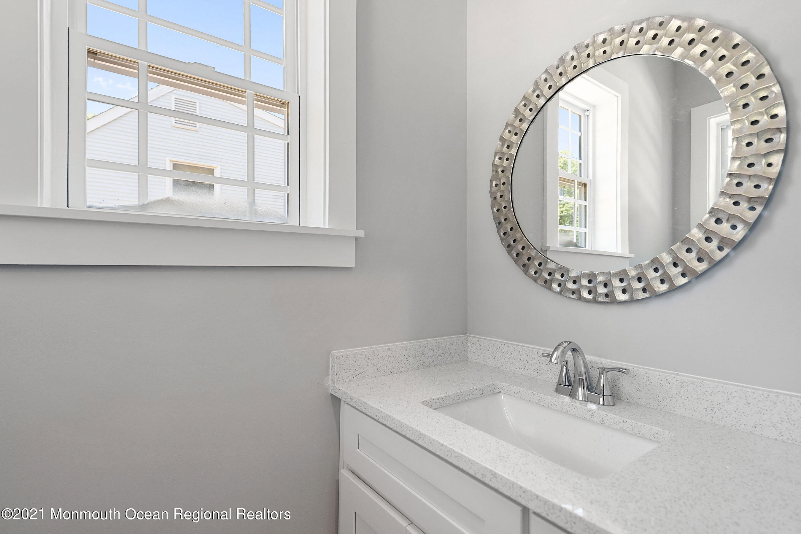 308 Riverside Drive Bayville, NJ 08721 - Photo 19 of 35 a bathroom with a sink and a mirror