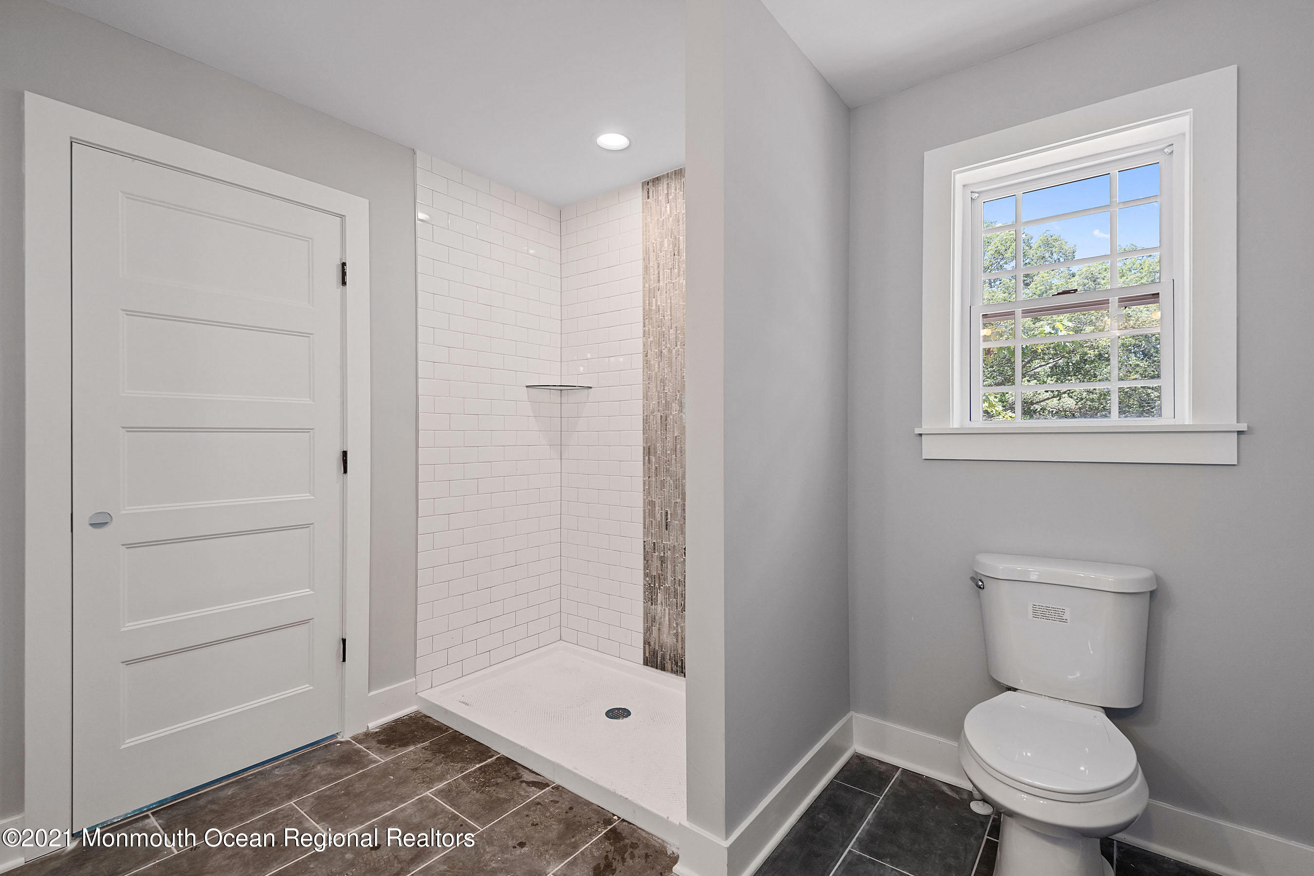 308 Riverside Drive Bayville, NJ 08721 - Photo 30 of 35 a bathroom with a toilet and a shower