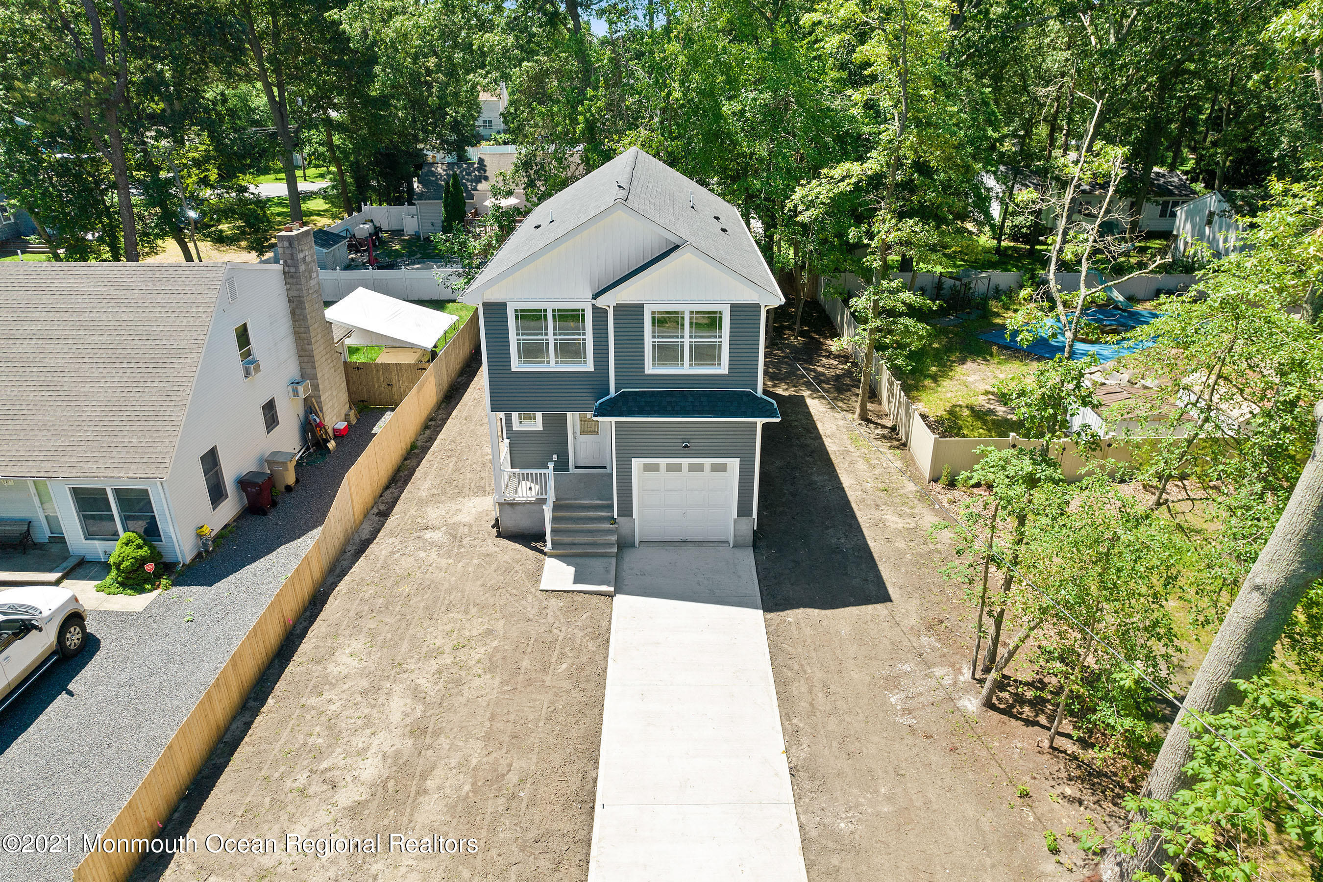 308 Riverside Drive Bayville, NJ 08721 - Photo 4 of 35 a view of balcony with wooden floor and grass