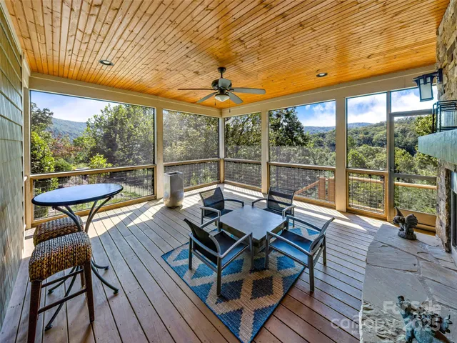 a view of a patio with wooden floor