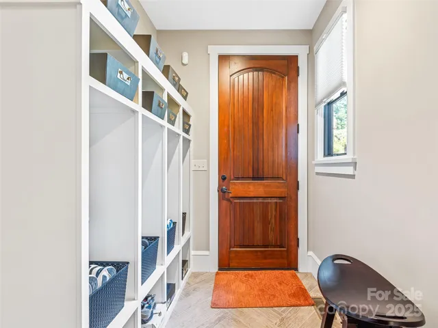 a view of entryway with a front door