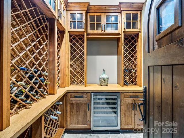 a living room with furniture a wooden floor and a table