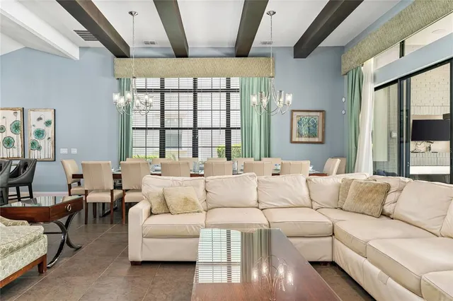 a room with furniture and pool table