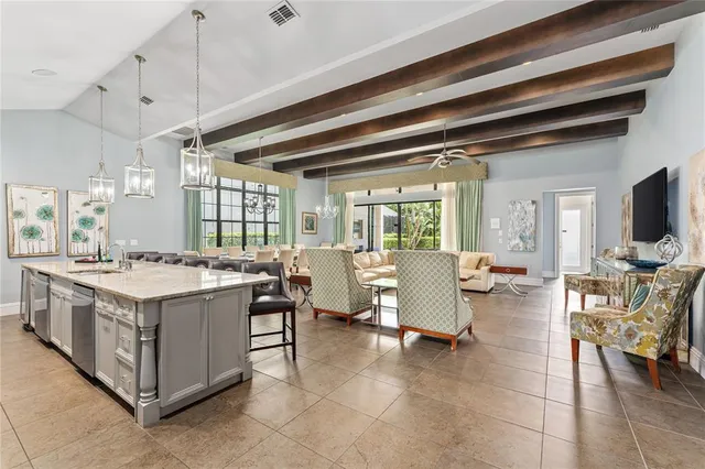 a bathroom with a double vanity sink mirror and toilet