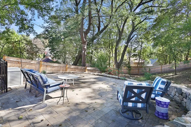 a view of a chairs and tables in the patio