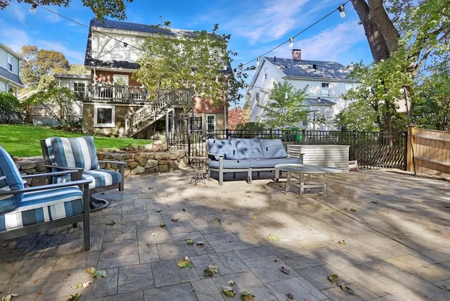 a view of an chairs and tables in the patio