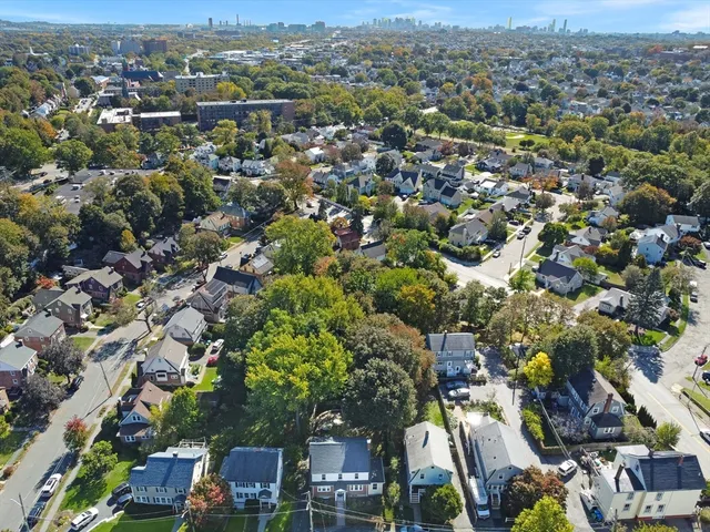 an aerial view of a city with lots of residential buildings