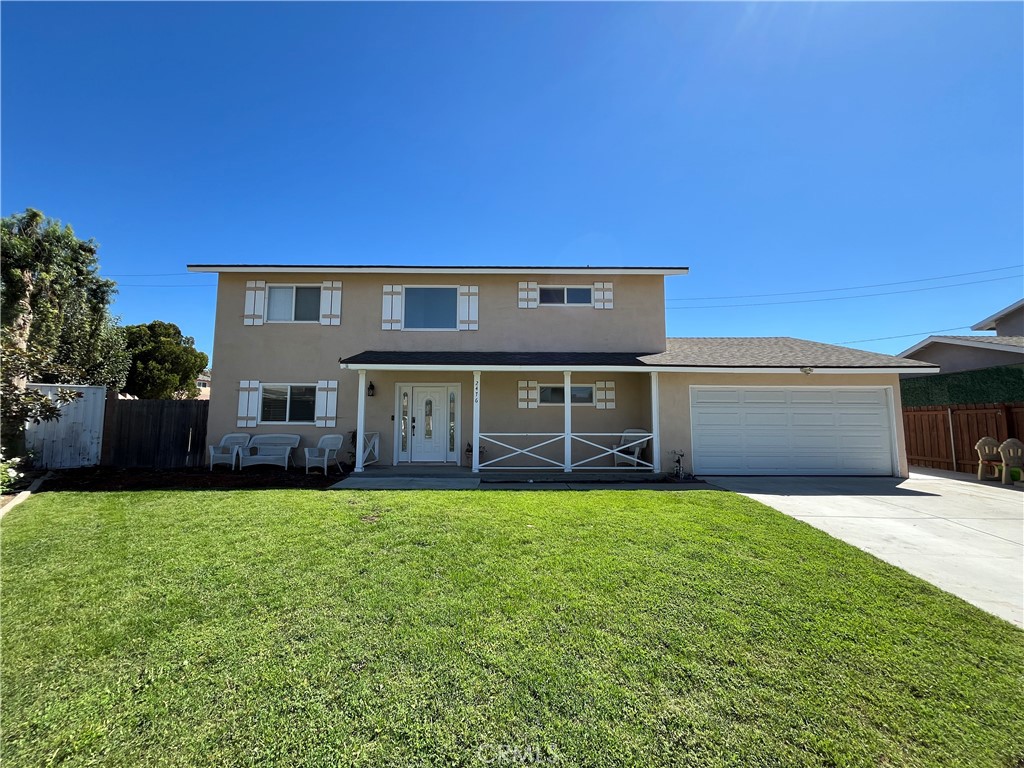 2476 Pierce Court Simi Valley, CA 93065 - Photo 1 of 18 a large house with a big yard and large trees