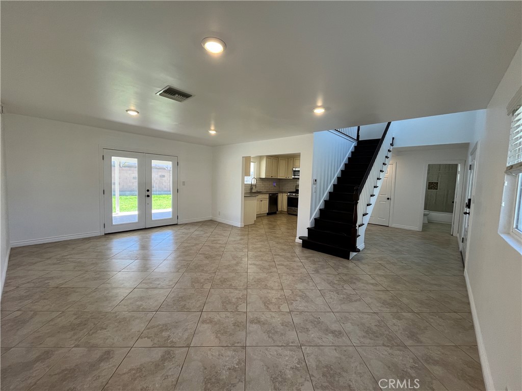 2476 Pierce Court Simi Valley, CA 93065 - Photo 4 of 18 a view of a big room with entryway stairs and livingroom