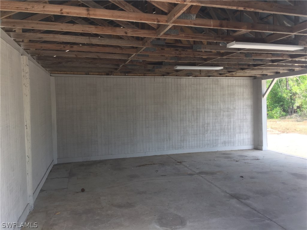 20291 Carter Road Estero, FL 33928 - Photo 5 of 25 a view of a room with an empty space