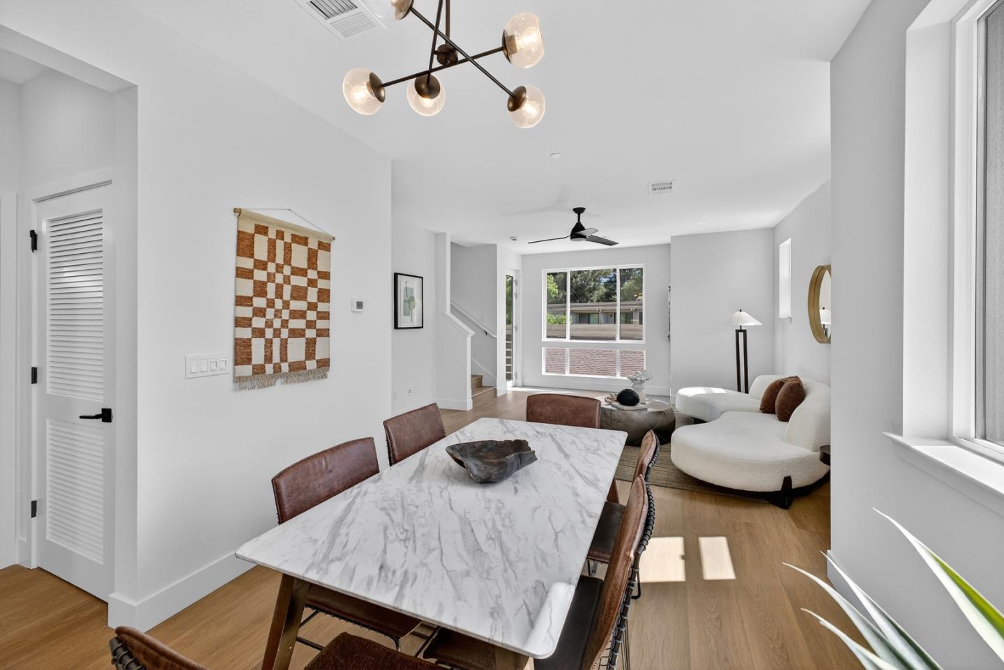 955 Woodside Road Redwood City, CA 94061 - Photo 22 of 46 a living room with furniture and a large window