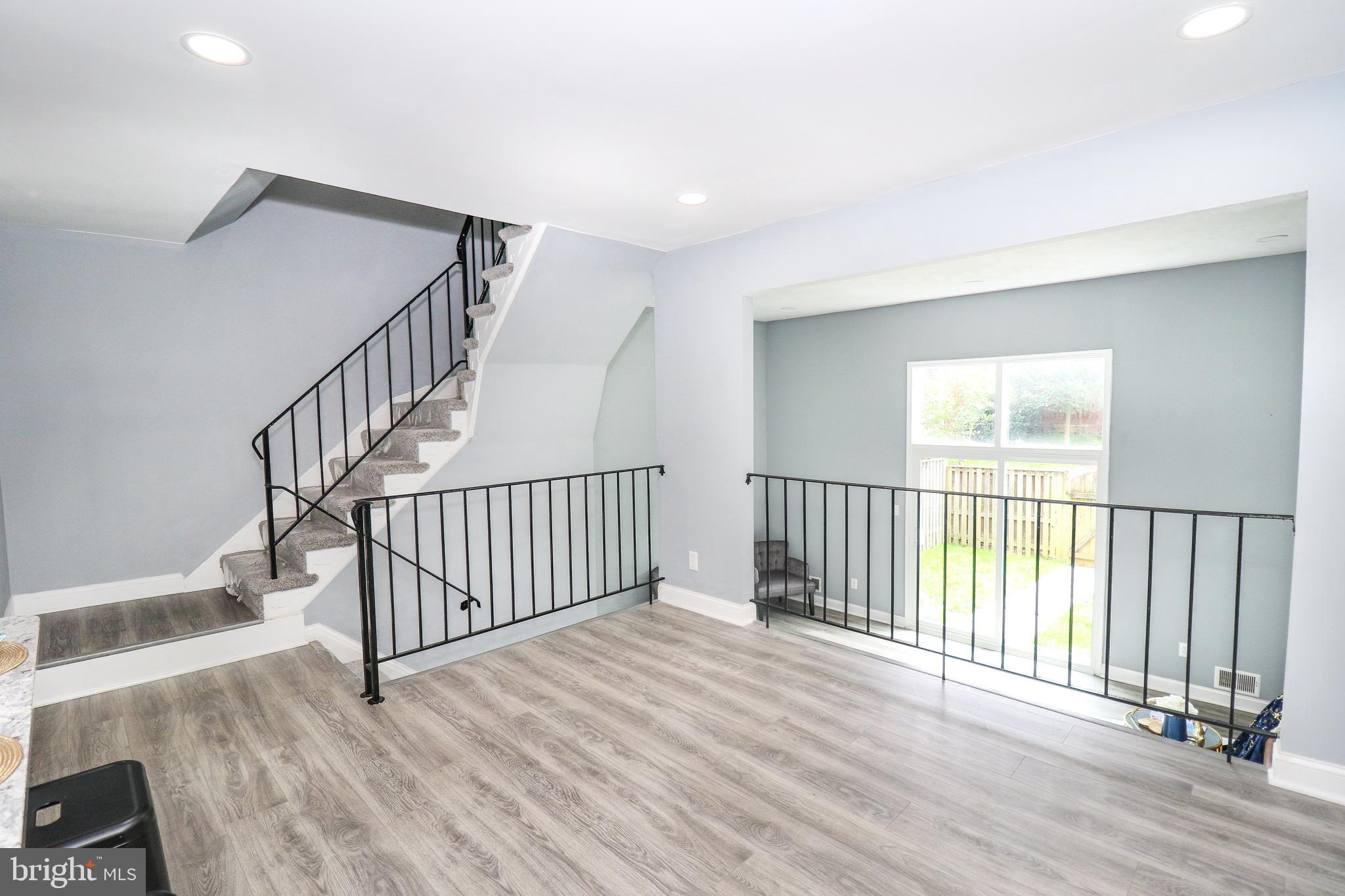 2309 Ravensdon Court Reston, VA 20191 - Photo 11 of 76 a view of entryway with wooden floor