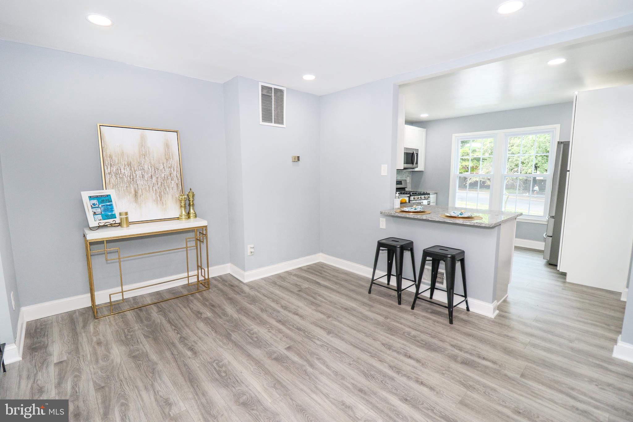 2309 Ravensdon Court Reston, VA 20191 - Photo 14 of 76 a workspace with furniture window and wooden floor