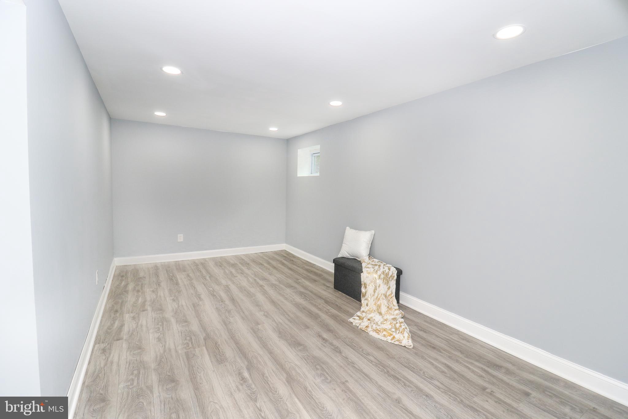 2309 Ravensdon Court Reston, VA 20191 - Photo 33 of 76 a view of empty room with wooden floor