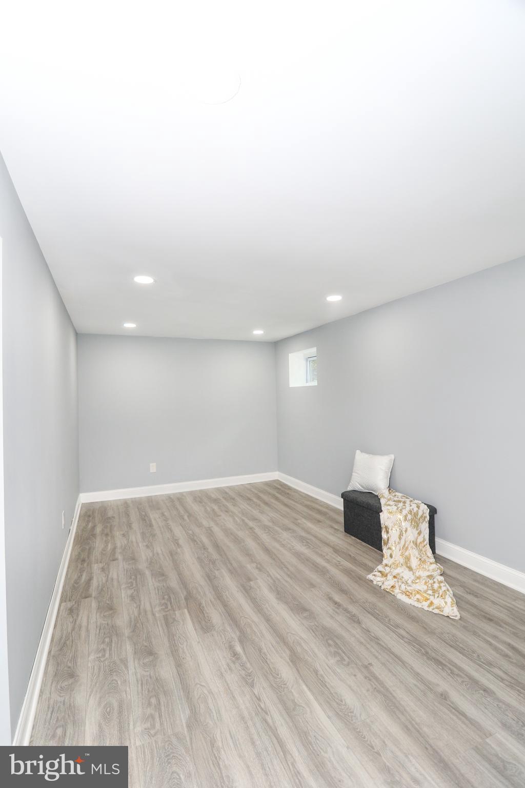 2309 Ravensdon Court Reston, VA 20191 - Photo 34 of 76 a view of empty room with wooden floor