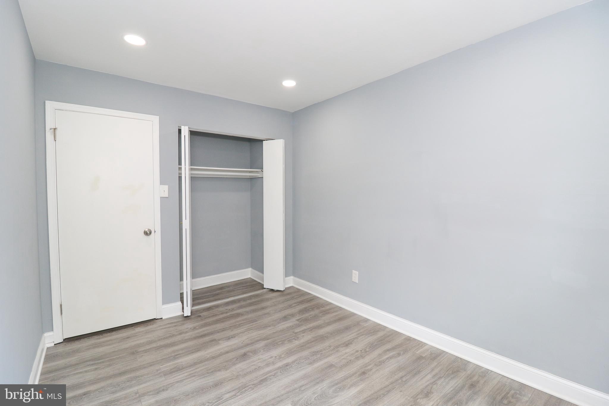 2309 Ravensdon Court Reston, VA 20191 - Photo 48 of 76 a view of an empty room with wooden floor