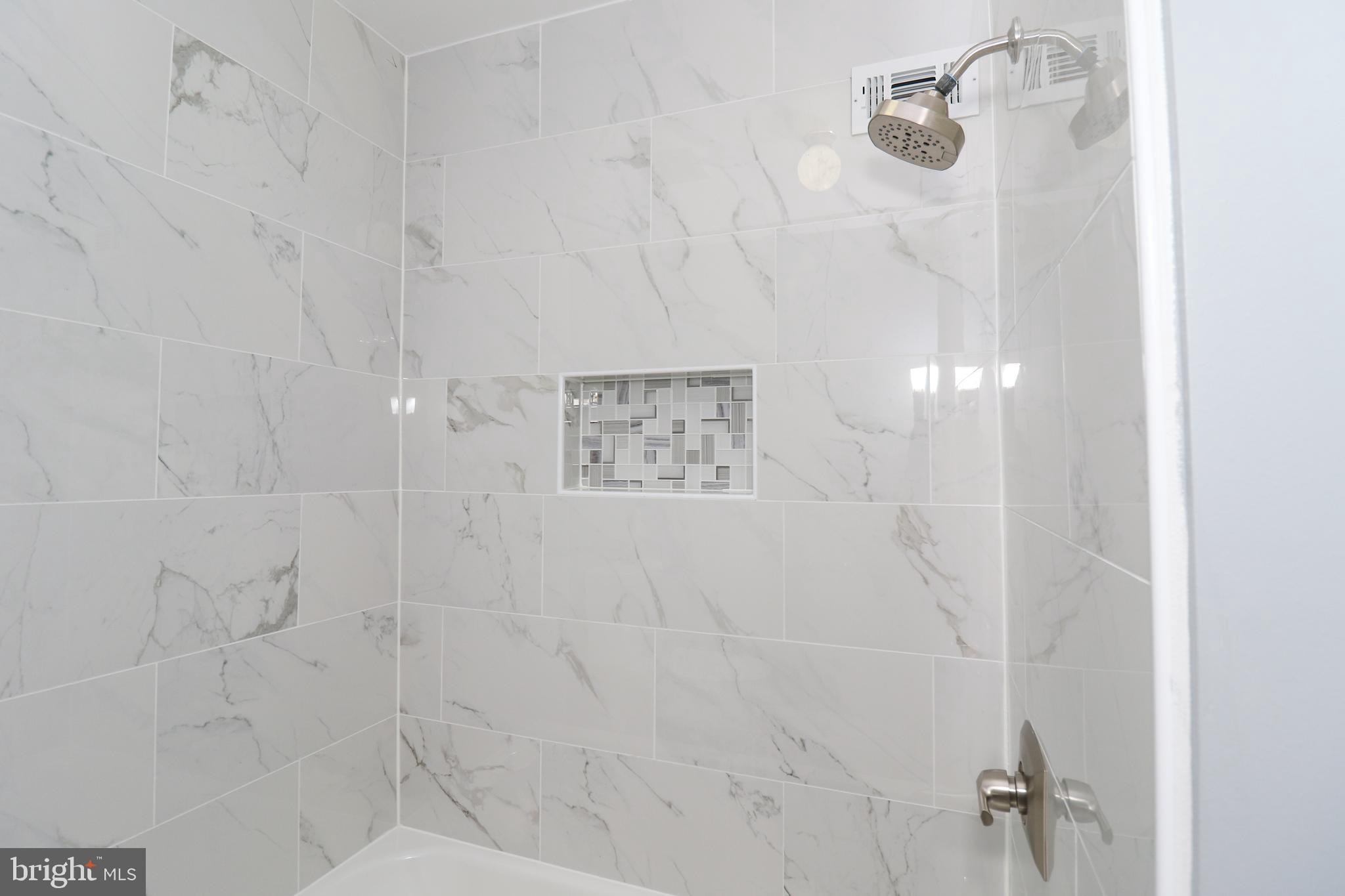 2309 Ravensdon Court Reston, VA 20191 - Photo 55 of 76 a bathroom with shower