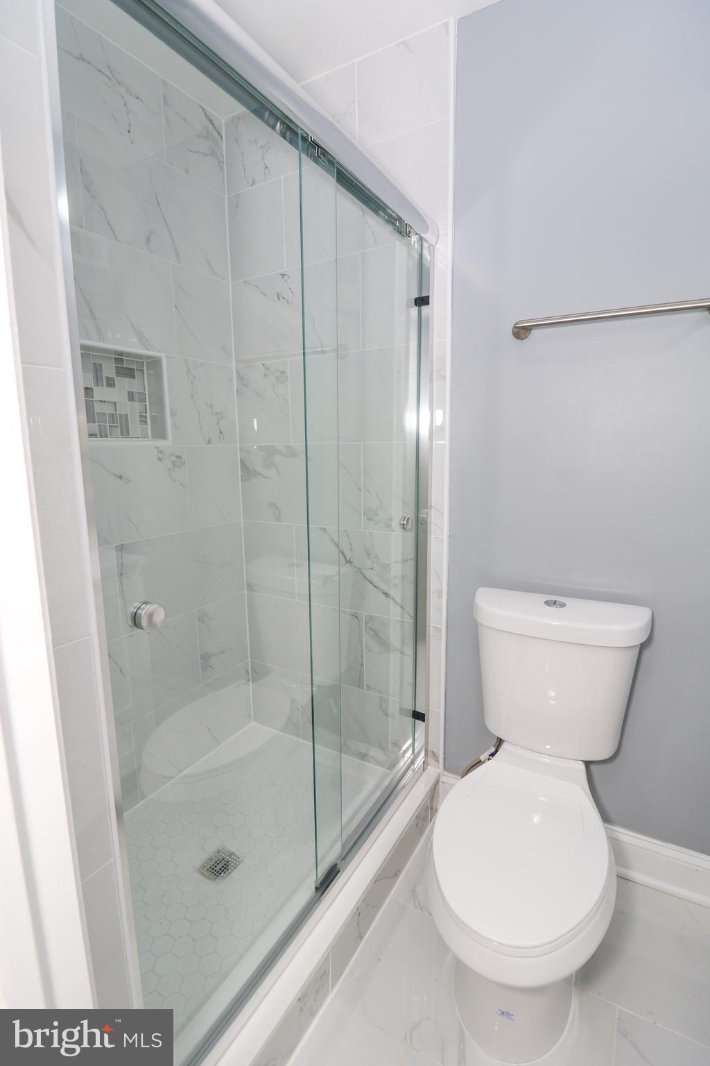 2309 Ravensdon Court Reston, VA 20191 - Photo 72 of 76 a bathroom with a toilet and a shower