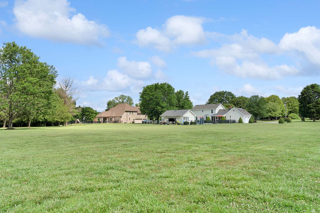 205 Spring Valley Road Hendersonville, TN 37075 - Photo 13 of 51 a backyard of a house with lots of green space