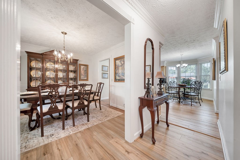 205 Spring Valley Road Hendersonville, TN 37075 - Photo 16 of 51 a view of a a dining room with furniture window and wooden floor