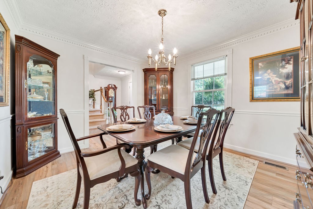 205 Spring Valley Road Hendersonville, TN 37075 - Photo 18 of 51 a view of a dining room with furniture window and wooden floor