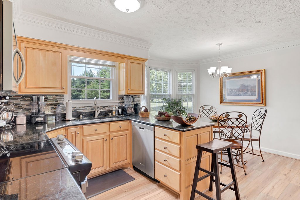 205 Spring Valley Road Hendersonville, TN 37075 - Photo 20 of 51 a kitchen that has a sink and chairs