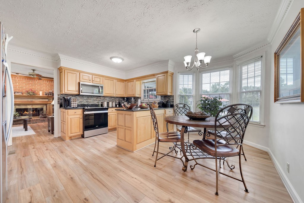 205 Spring Valley Road Hendersonville, TN 37075 - Photo 23 of 51 a view of a dining room with furniture window and wooden floor