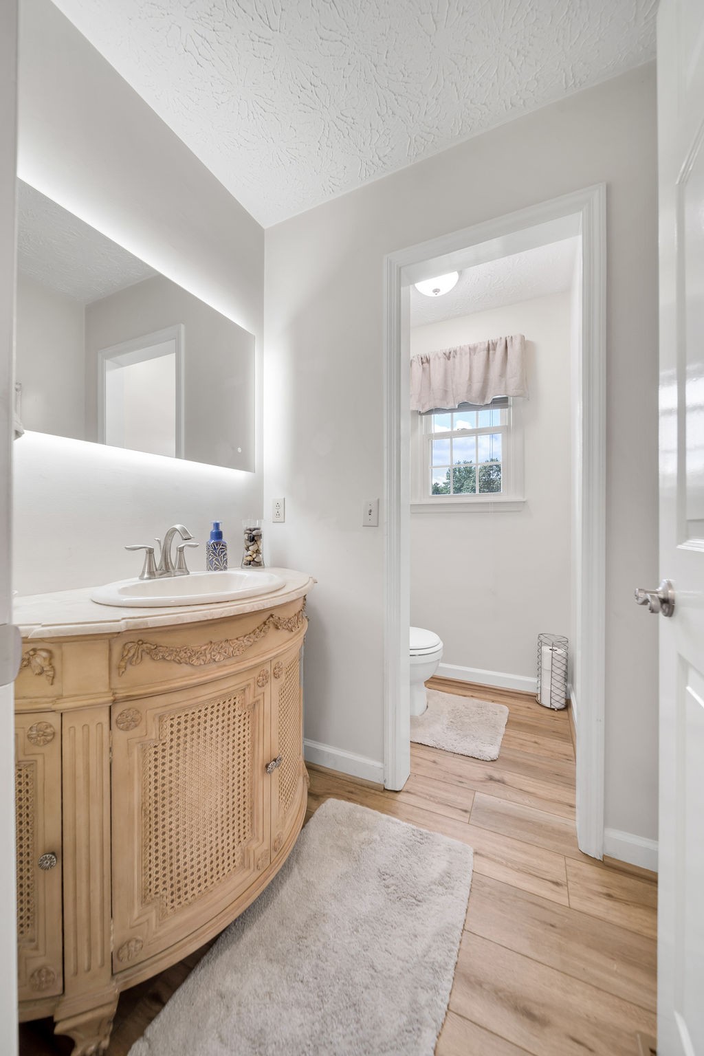 205 Spring Valley Road Hendersonville, TN 37075 - Photo 25 of 51 a spacious bathroom with a sink a mirror and a bathtub