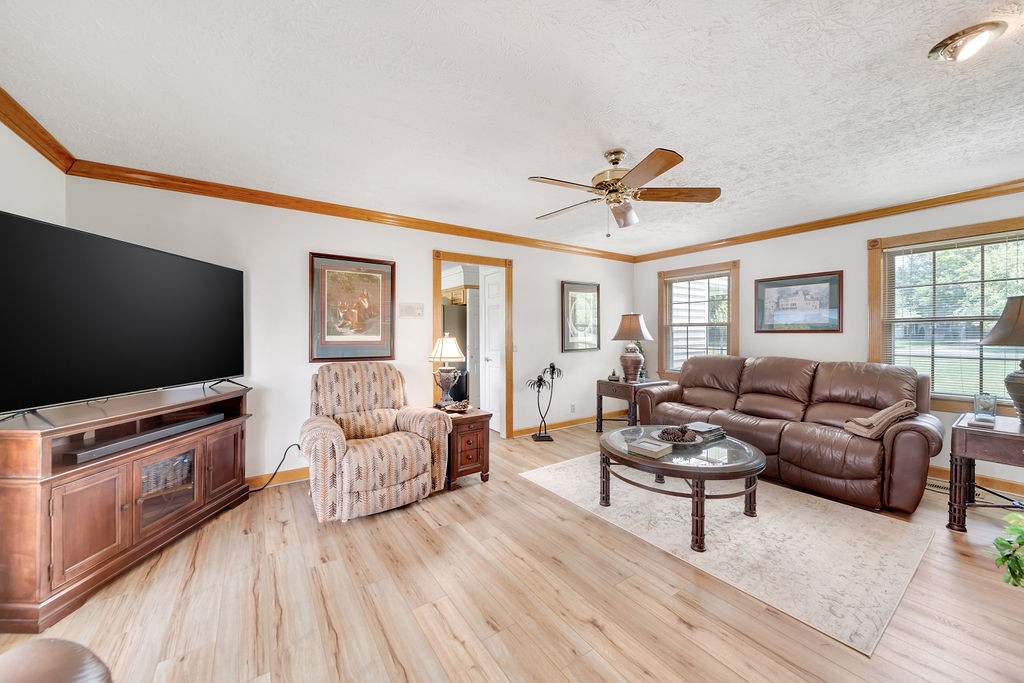 205 Spring Valley Road Hendersonville, TN 37075 - Photo 42 of 51 a living room with furniture and a flat screen tv