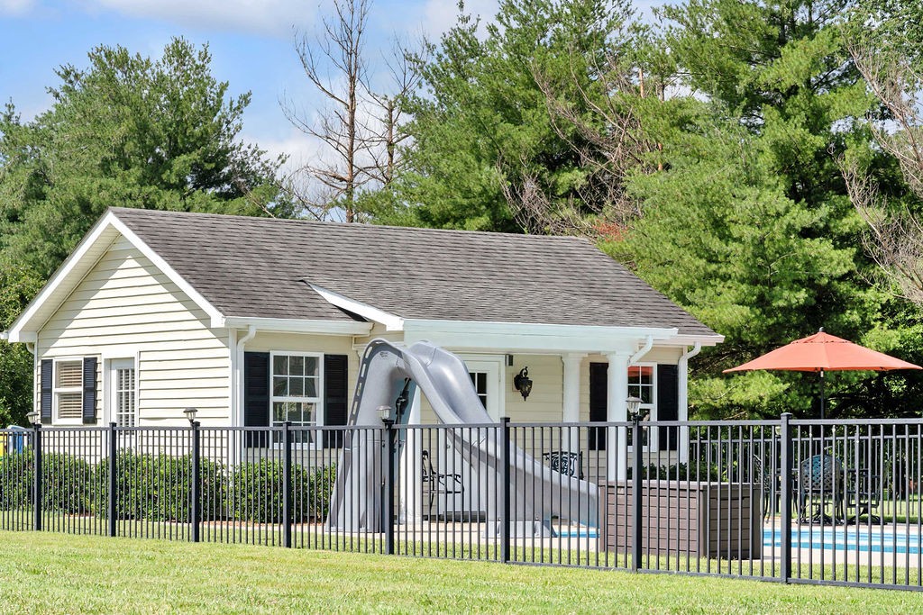 205 Spring Valley Road Hendersonville, TN 37075 - Photo 5 of 51 a view of a house with a yard and a garden