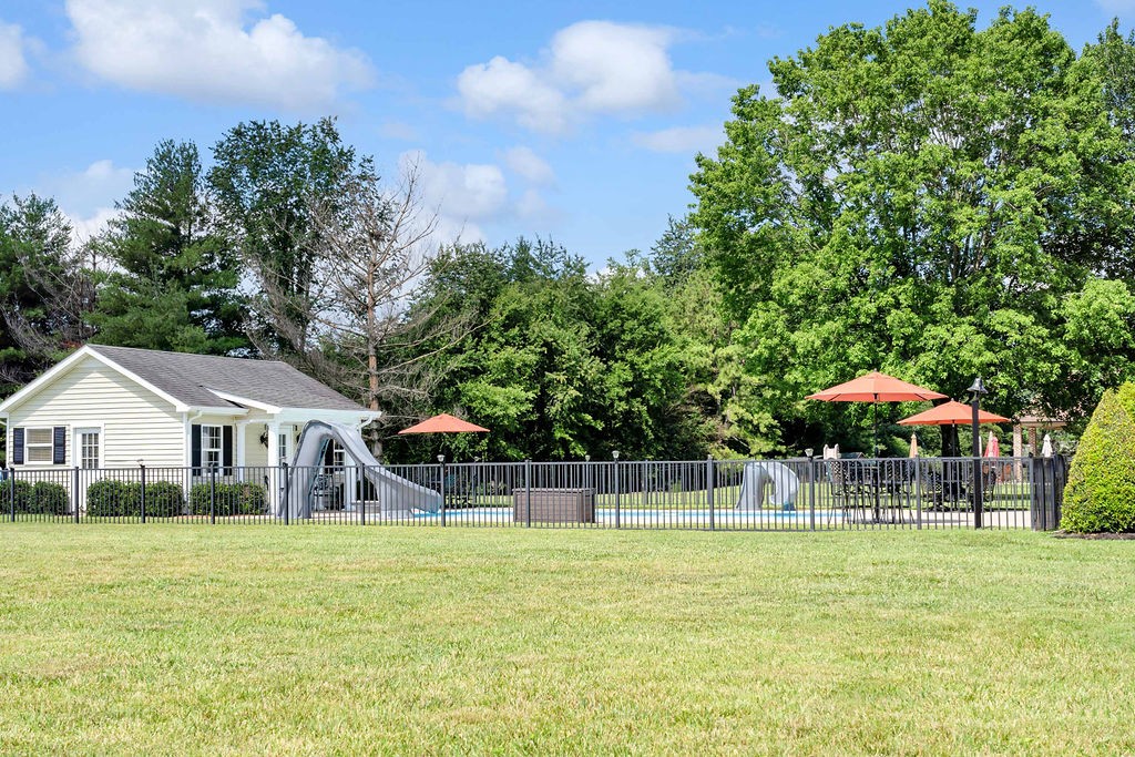 205 Spring Valley Road Hendersonville, TN 37075 - Photo 6 of 51 a front view of a house with a garden