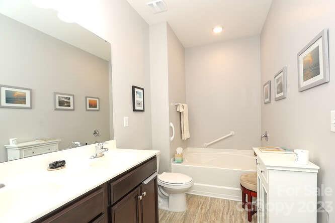 9728 Chase View Drive Matthews, NC 28105 - Photo 14 of 25 a bathroom with a sink a toilet and a bathtub