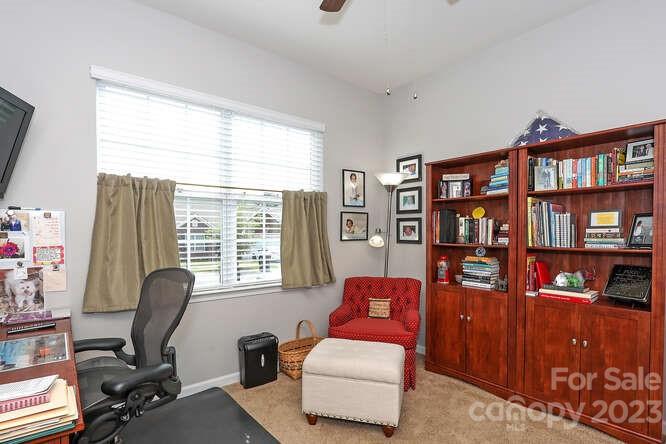 9728 Chase View Drive Matthews, NC 28105 - Photo 16 of 25 a view of a livingroom with workspace and a window