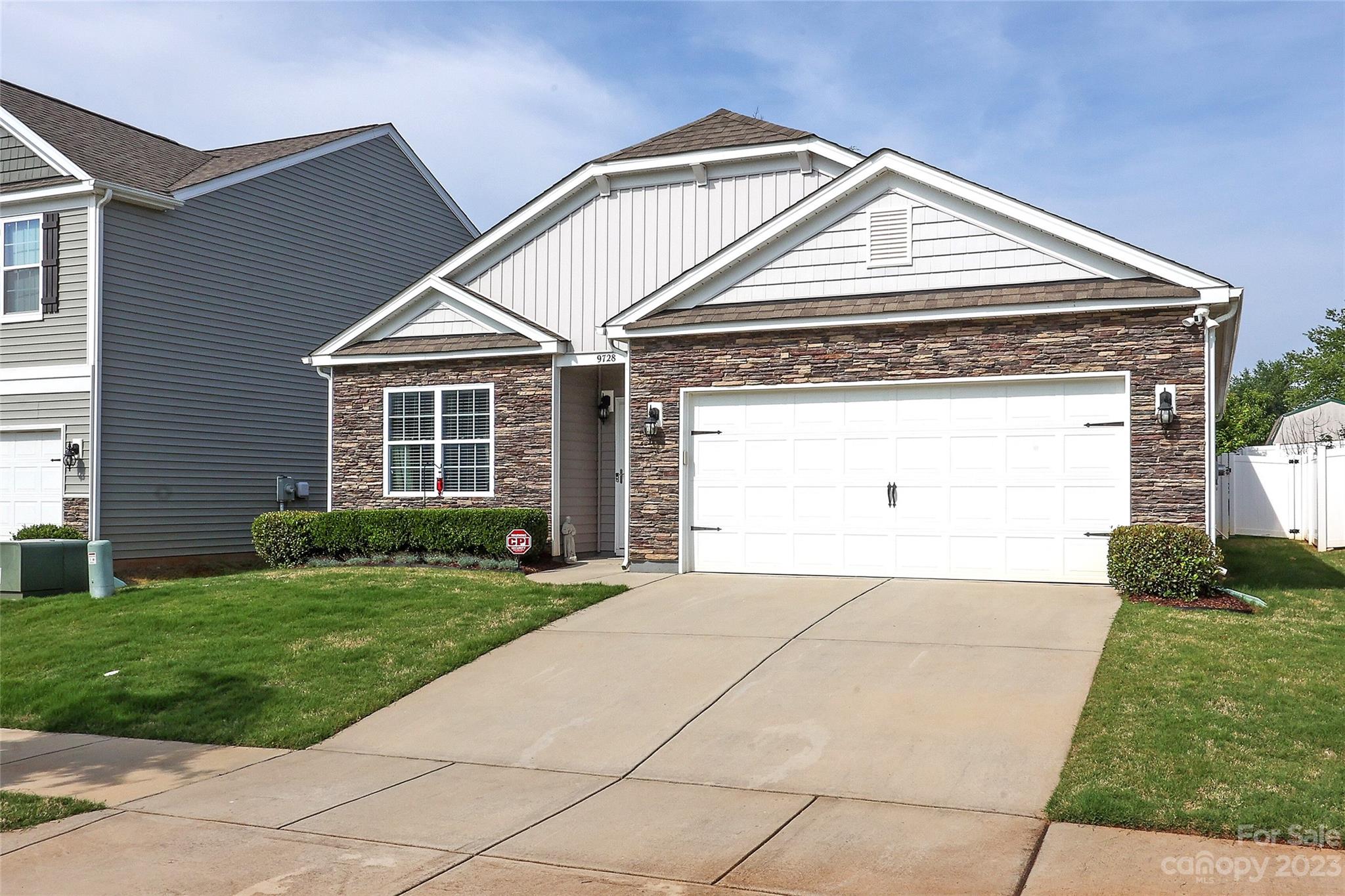 9728 Chase View Drive Matthews, NC 28105 - Photo 2 of 25 a front view of a house with a yard