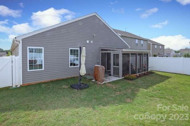9728 Chase View Drive Matthews, NC 28105 - Photo 21 of 25 a backyard of a house with table and chairs
