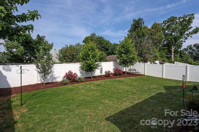 9728 Chase View Drive Matthews, NC 28105 - Photo 23 of 25 a view of a backyard