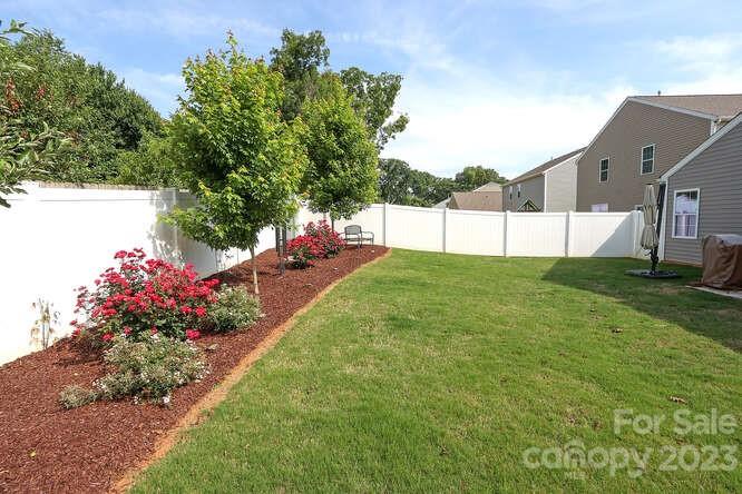 9728 Chase View Drive Matthews, NC 28105 - Photo 24 of 25 a view of a backyard