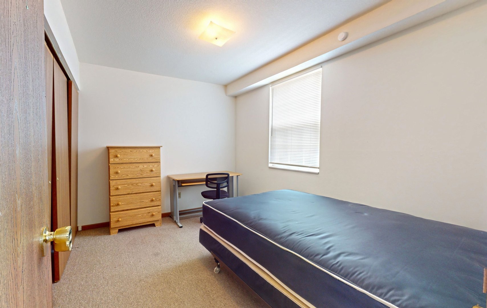 1007 South Locust Street Champaign, IL 61820 - Photo 8 of 18 wooden floor with a bed and a window