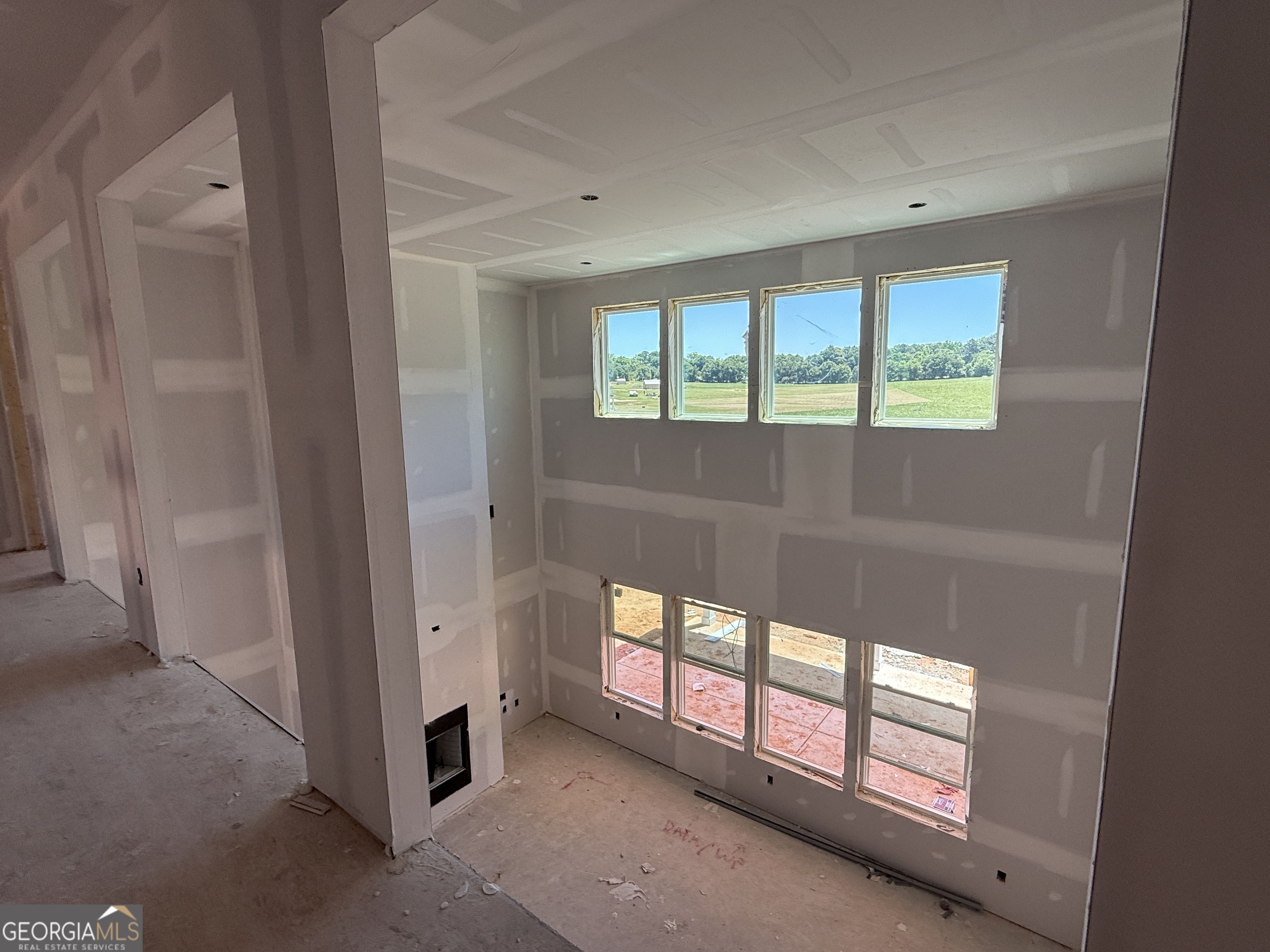 10 Rex Road Williamson, GA 30292 - Photo 15 of 63 wooden floor in an empty room with a window