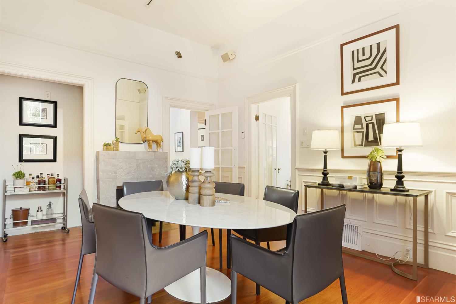 720 Waller Street San Francisco, CA 94117 - Photo 11 of 44 a dining room with furniture and wooden floor