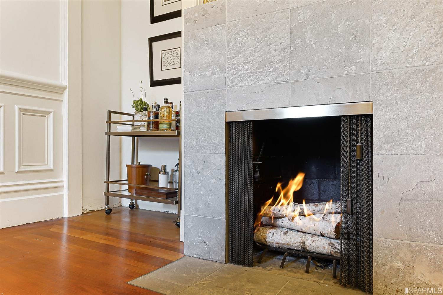 720 Waller Street San Francisco, CA 94117 - Photo 12 of 44 a living room with furniture and a fireplace