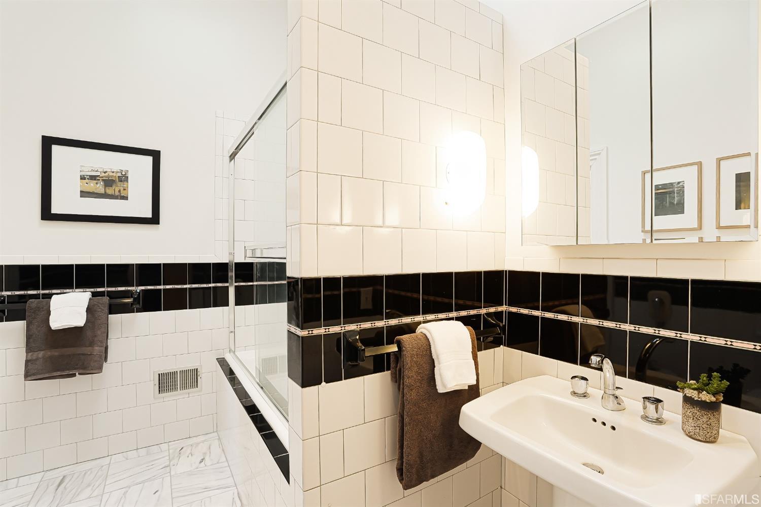 720 Waller Street San Francisco, CA 94117 - Photo 20 of 44 a bathroom with a sink and a shower