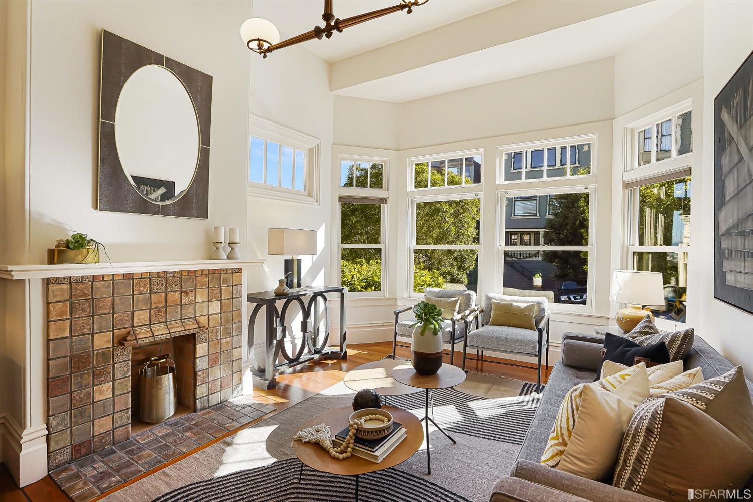 720 Waller Street San Francisco, CA 94117 - Photo 2 of 44 a living room with furniture and a fireplace